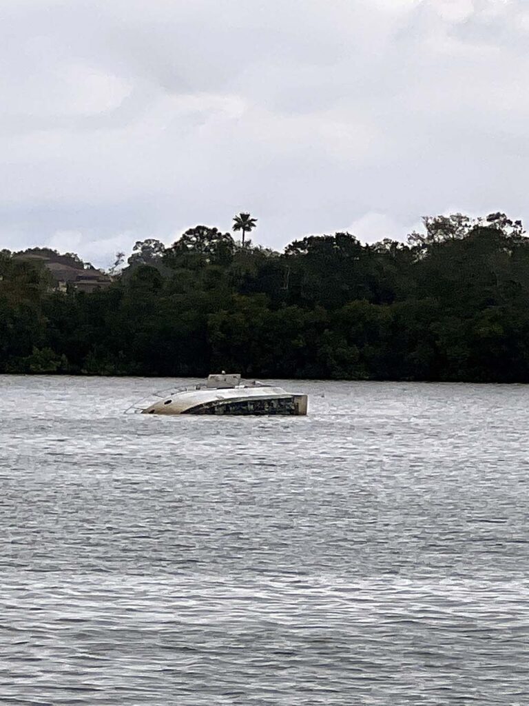 Another capsized boat
